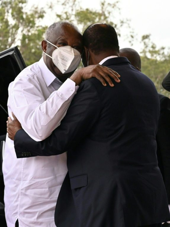 Gbagbo (L) met President Alassane Ouattara for long-awaited talks in July