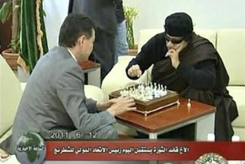 Libyan leader Muammar Gaddafi plays chess with Kirsan Ilyumzhinov