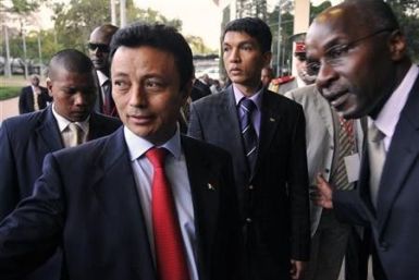 Madagascar&quot;s former President Marc Ravalomanana (L), current President Andry Rajoelina (C)