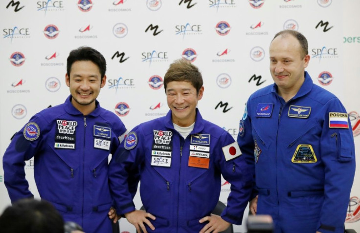 After a decade-long pause, Russia will send two Japanese tourists, including billionaire Yusaku Maezawa (C),to the ISS in December, capping a year that has been a milestone for amateur space travel