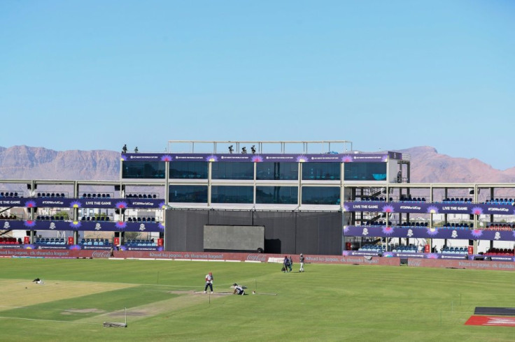 It all starts now: Workers prepare the aAl-Amerat Cricket Stadium in Oman's capital Muscat
