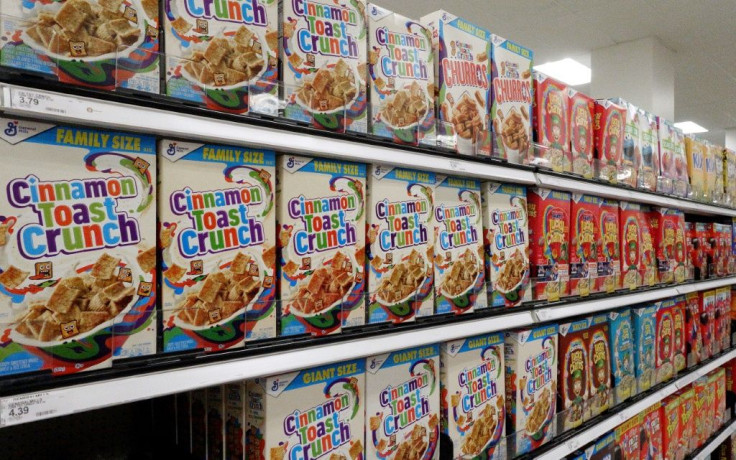 Cinnamon Toast Crunch 18.8-ounce boxes are on display on a supermarket shelf