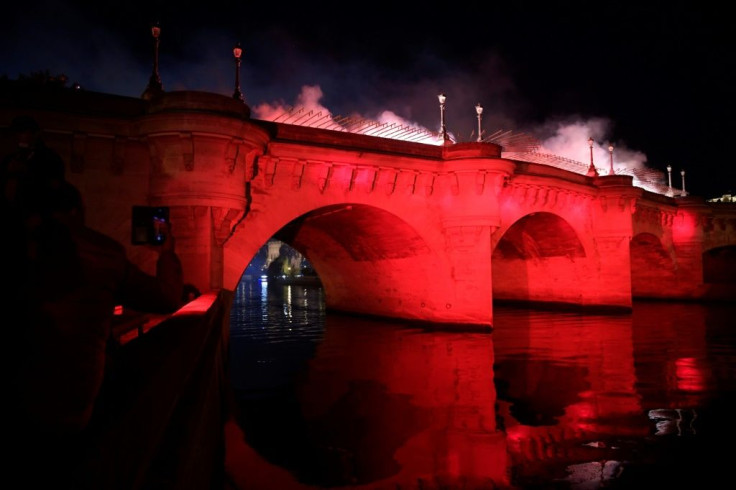 Bodies were thrown into the River Seine, here illuminated in red after a ceremony to commemorate the brutal repression of October 17, 1961