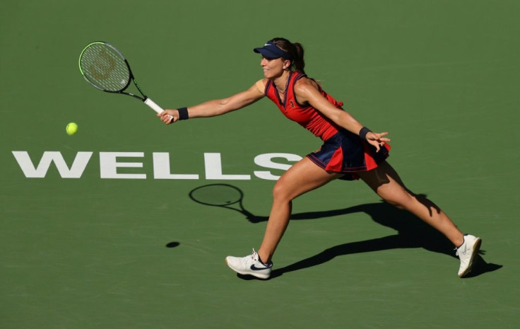Spain's Paula Badosa plays a forehand en route to a marathon three-set win over Victoria Azarenka of Belarus during the women's final at the WTA Indian Wells in Southern California