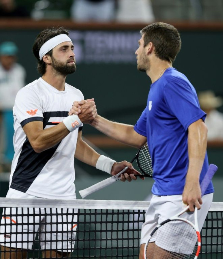 Britain's Cameron Norrie shakes hands with Nikoloz Basilashvili after his three-set victory over the Georgian in the final of the ATP Indian Wells Masters