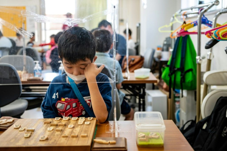 A student practises during a shogi class in Kashiwa, Chiba