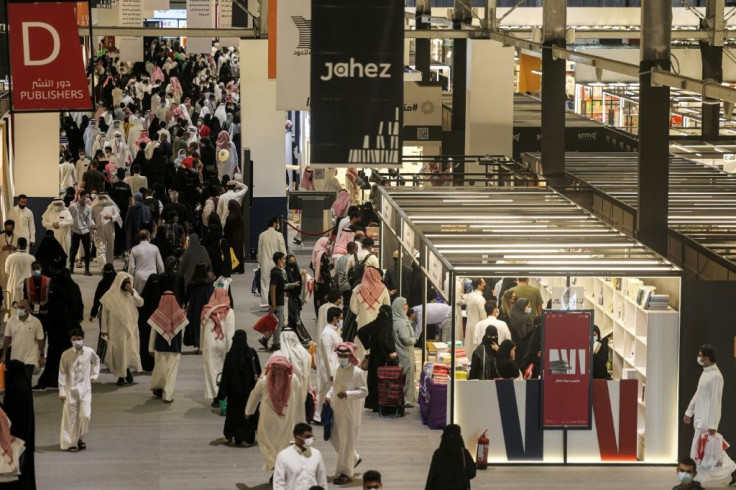 People visit a pavilion at the Riyadh International Book Fair -- many Saudis expressed delight at the range of titles on show, but there was some online backlash