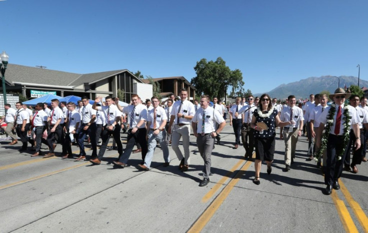 A group of missionaries from the Church of Jesus Christ and Latter-Day Saints during a July 4 parade in 2018 in Provo, Utah