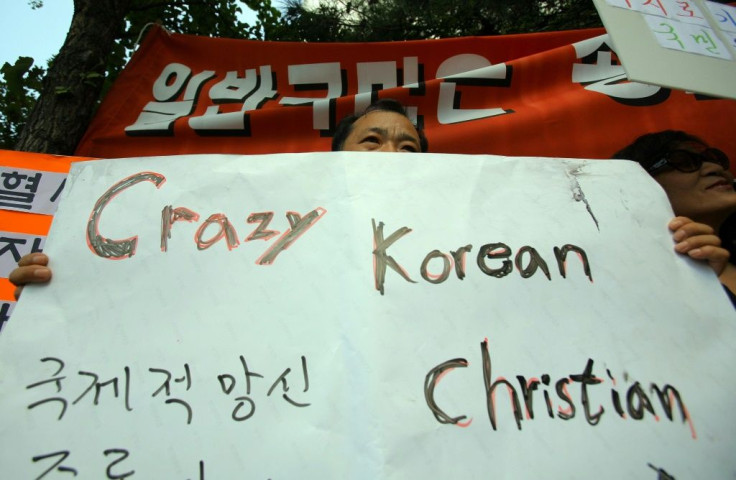 South Korean protestors shout slogans during a 2007 protest against Saem-Mul Presbyterian church that sent 23 missionaries who were kidnapped in Afghanistan