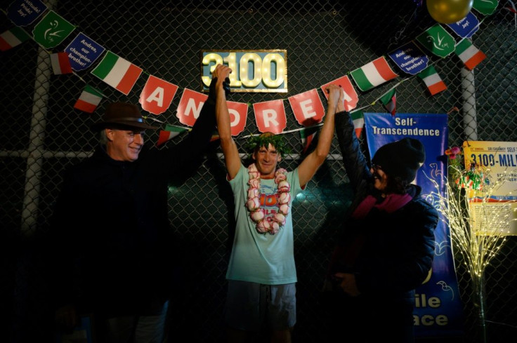 Andrea Marcato of Italy poses after winning the 'Self-Transcendence 3100 Mile Race', the world's longest certified foot race, in the Queens borough of New York on October 17, 2021