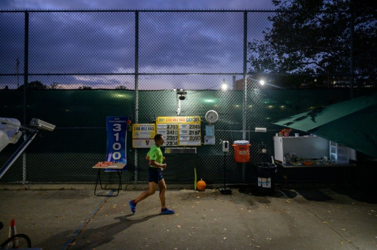 Participants of the 'Self-Transcendence 3100 Mile Race' in New York run between 6:00 am and midnight