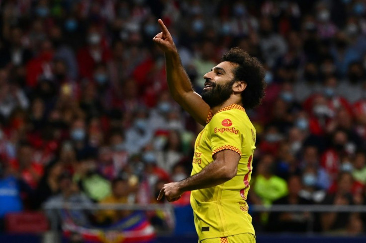 Mohamed Salah scored twice for Liverpool in a dramatic game in Madrid
