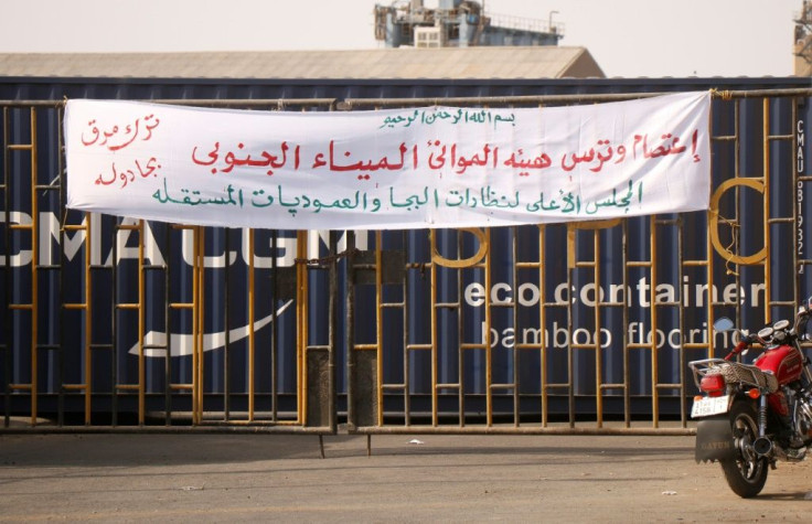 A banner in Arabic announcing the sit-in and blockade of the southern port is pictured at its main entrance in Port Sudan on September 20, 2021