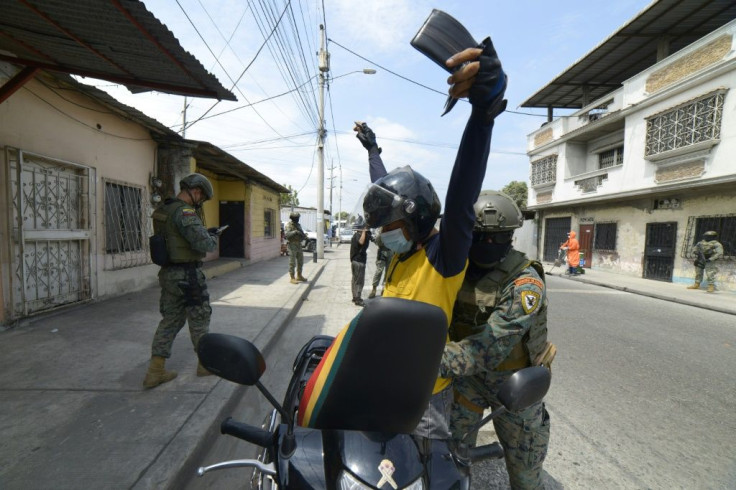 Ecuadorian Marines carry out security operations in Guayaquil after President Guillermo Lasso declared a state of emergency