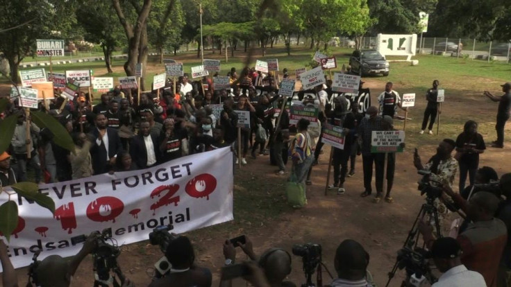 IMAGES Under heavy police watch, Nigerians protested in Abuja and Lagos on year after the EndSARS demonstrations