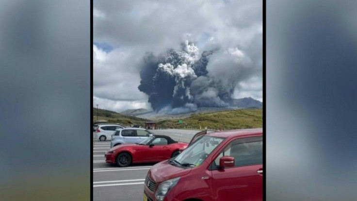 Japan's Mount Aso spews a giant column of ash
