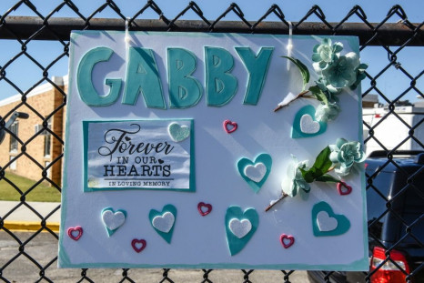A sign for Gabby Petito is seen outside of a funeral home in Holbrook, New York