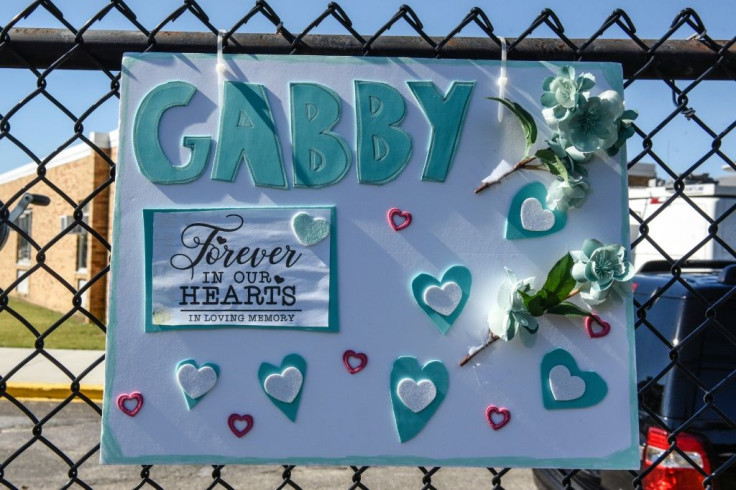 A sign for Gabby Petito is seen outside of a funeral home in Holbrook, New York
