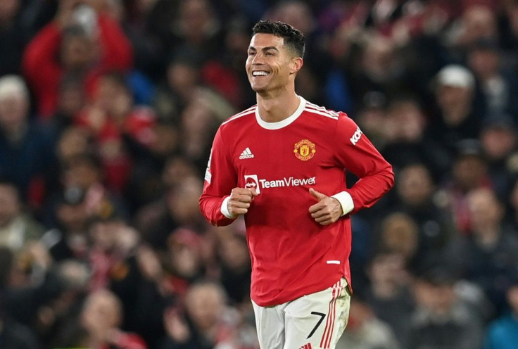 Cristiano Ronaldo celebrates after scoring Manchester United's winning goal against Atalanta