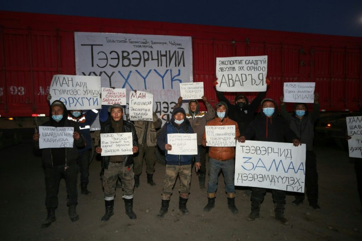 Truck drivers protest near Tavan Tolgoi, Mongolia's largest coal deposit, on October 16