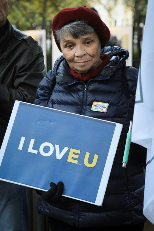 A demonstrator outside the Polish Constitutional Court in Warsaw on October 7, when it ruled that EU law can only apply in specific, circumscribed areas