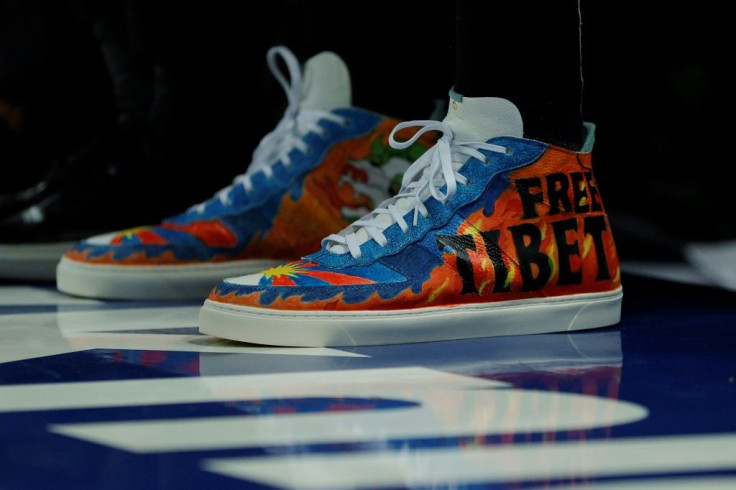 Kanter wore the 'Free Tibet' sneakers on the sidelines of the Celtics' defeat to the New York Knicks