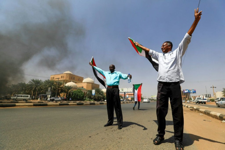 One faction backs the transition to civilian rule, while supporters of a breakaway faction demand the military take over