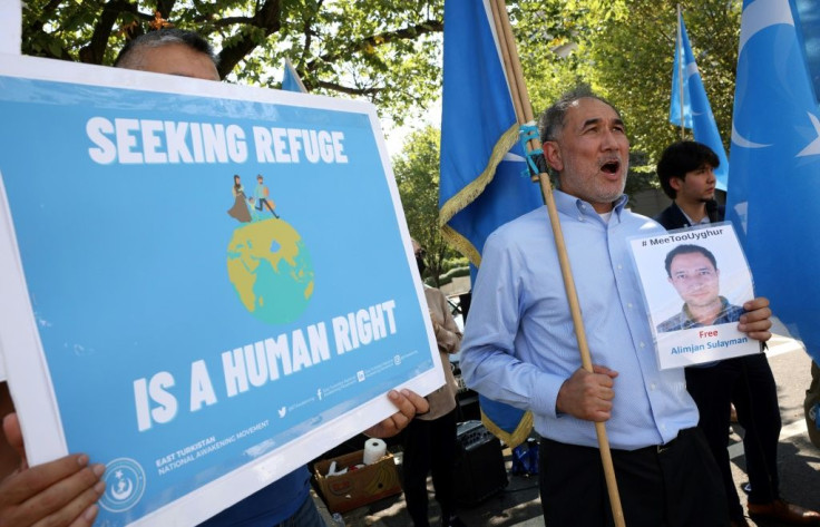 Members of the Uyghur community rally against the Chinese government at the State Department on September 15, 2021 in Washington, DC