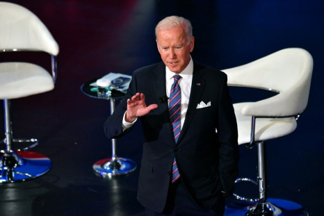 US President Joe Biden says his investment bills should pass but he appears to drop a demand for higher taxes on the richest Americans