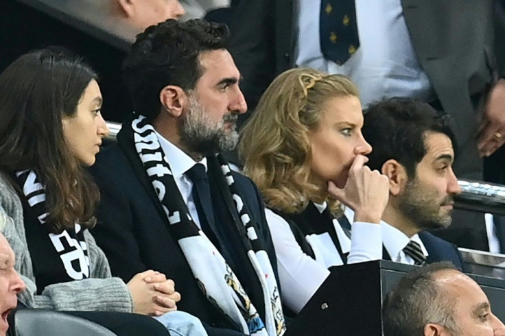 Newcastle's chairman Yasir Al-Rumayyan (C) and director Amanda Staveley (R)