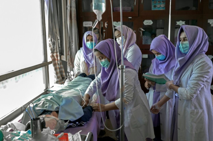 Teachers at the midwifery college say they continue to work for humanitarian reasons and to help women in the community