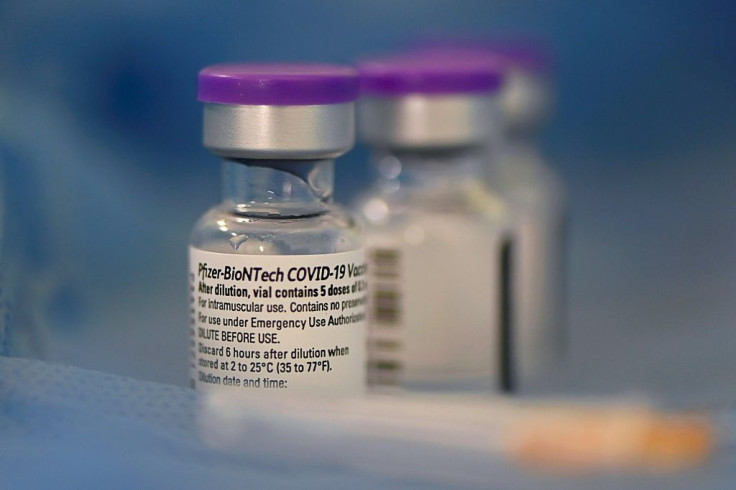 This file photo taken on March 04, 2021 shows vials of the Pfizer-BioNTech vaccine against COVID-19 amid the coronavirus pandemic in Panama City