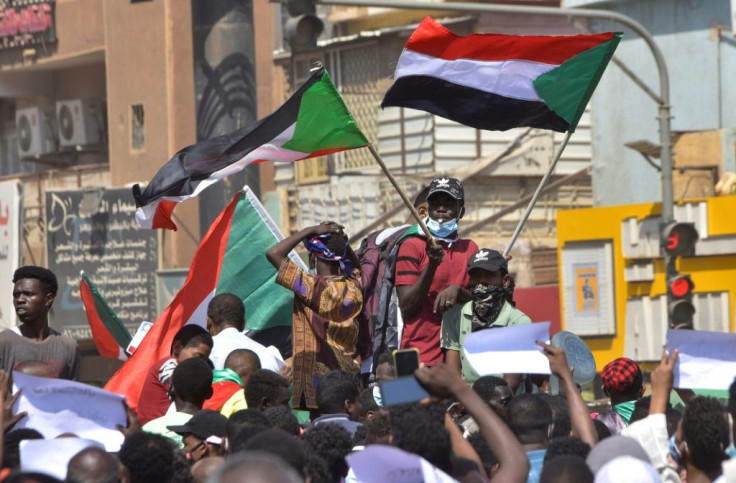 Protesters backing civilian rule demonstrate in Sudan; the two sides represent opposing factions of the Forces for Freedom and Change (FFC), which spearheaded demonstrations that led to the army's overthrow of Omar al-Bashir
