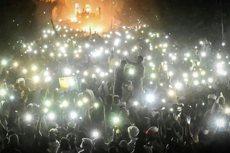 On Friday, TLP supporters used mobile phones as flashlights during the late hours of the protest