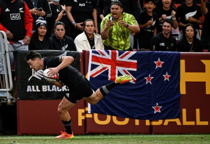 Damian McKenzie of New Zealand dives to score a try for the All Blacks during their rugby victory over the host United States on Saturday
