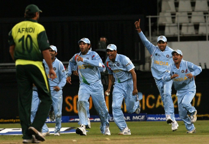 Contrasting emotions: Pakistan's Shahid Afridi leaves the ground as India celebrate their 'bowl-out' win at the T20 World Cup in Durban