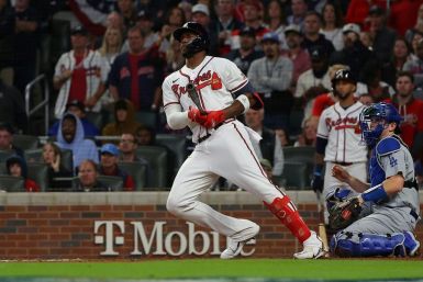 Atlanta's Jorge Soler hits a double during the eighth inning in the Braves 4-2 win over the Los Angeles Dodgers to wrap up their NLCS series in six games