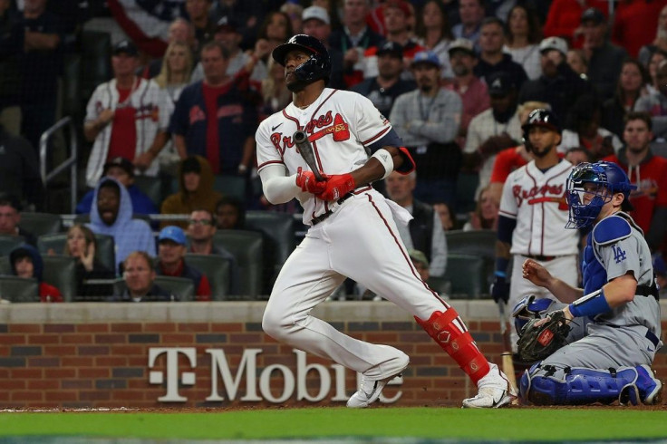 Atlanta's Jorge Soler hits a double during the eighth inning in the Braves 4-2 win over the Los Angeles Dodgers to wrap up their NLCS series in six games