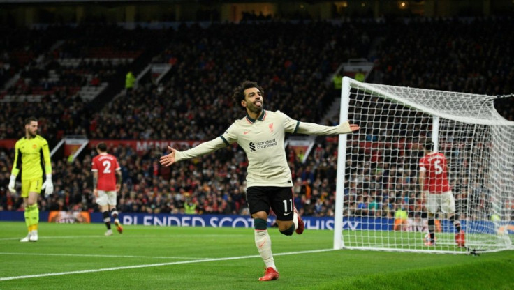 Mohamed Salah celebrates after scoring Liverpool's fifth goal, and his third, at Old Trafford