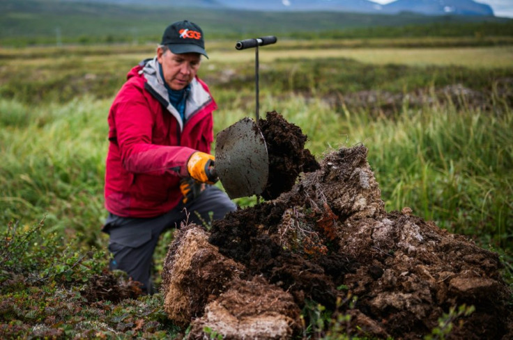 Researcher Keith Larson tracks the thawing of the permafrost which worries scientists because carbon stores, long locked in the permafrost, are now seeping out