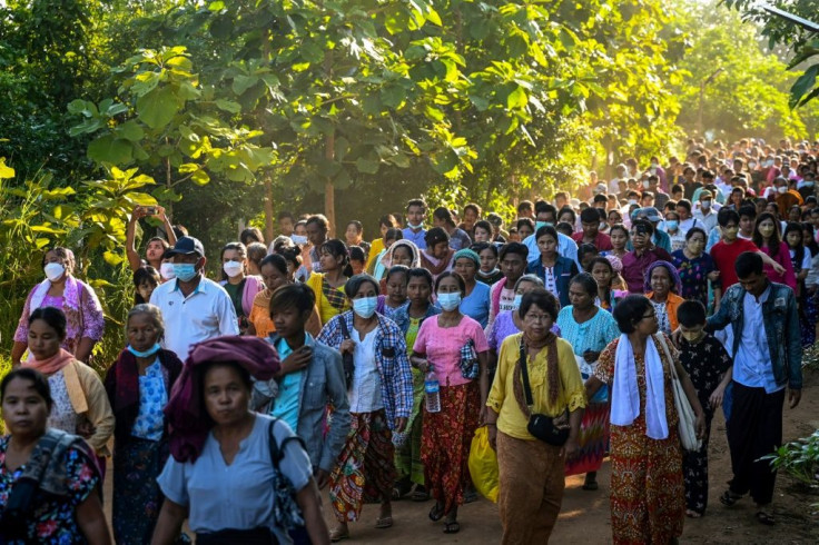 Thousands of pilgrims line come to Myaing Sayadaw each day, hoping for a glimpse of the monk