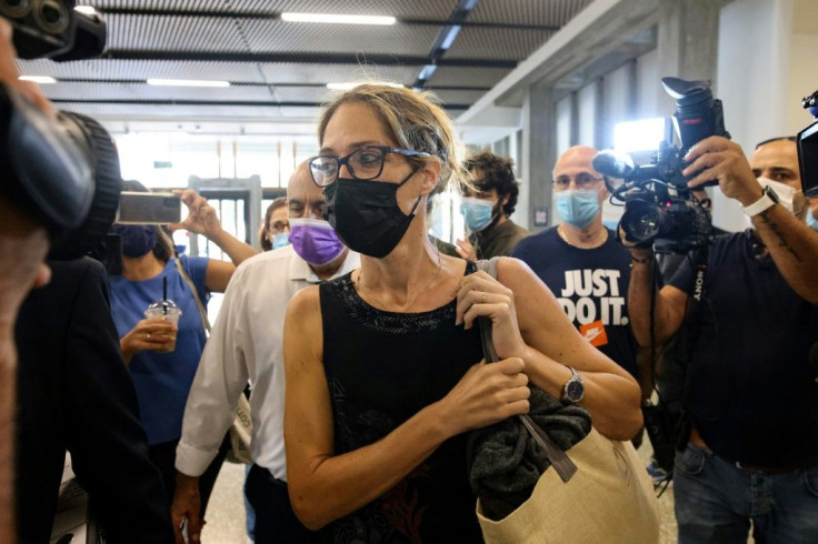 In this file photo taken on October 10, 2021, Aya Biran (C), paternal aunt of Eitan Biran who was the sole survivor of a deadly cable car crash in Italy, arrives at the court in the Israeli coastal city of Tel Aviv