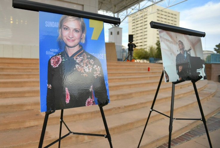 Photos of cinematographer Halyna Hutchins are displayed ahead a vigil held in her honor on October 23, 2021 in Albuquerque, New Mexico