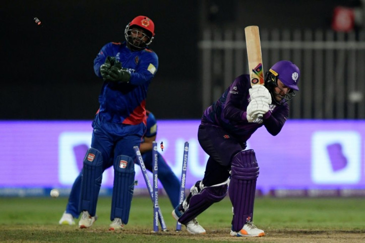 Scotland's Mark Watt (R) was one of five batters to fall to the spin of Mujeeb Ur Rahman