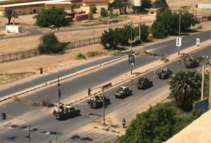 Military vehicles in the Sudanese capital Khartoum, shown in an image grab taken from a video by an anonymous source