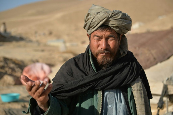 Camp elder Abdul Rahim Akbar does what he can to save his neighbours from having to make the awful choice