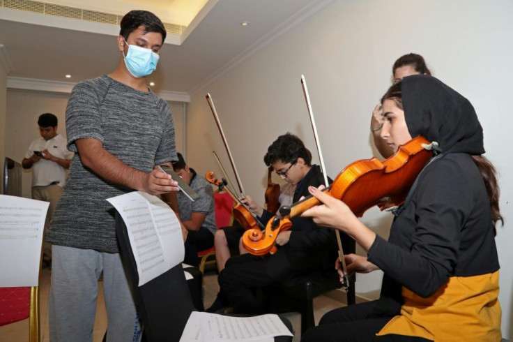 Mohammed Qambar Nawshad, conductor of the Afghan national orchestra, said he was happy to be making music again