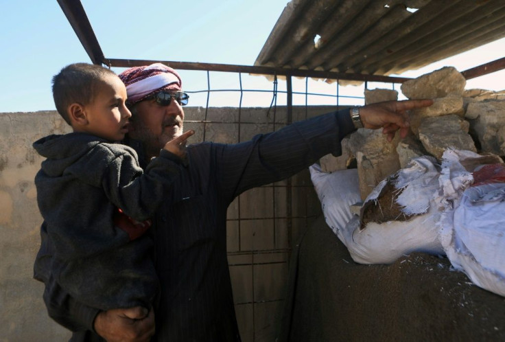 Ibrahim does not want to go back into regime-held territory so lives in a house without windows or doors on the rebel side of the line