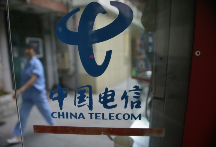 China Telecom, whose logo is seen in Shanghai, saw its US unit targeted by regulators