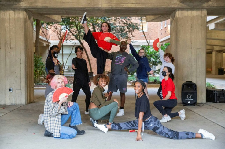 Chandler Dmitri Bradley (center, back) and Kayla Fluitt (center, front), pictured rehearsing in Richmond on October 22, say Virginians are switched on to local and national politics